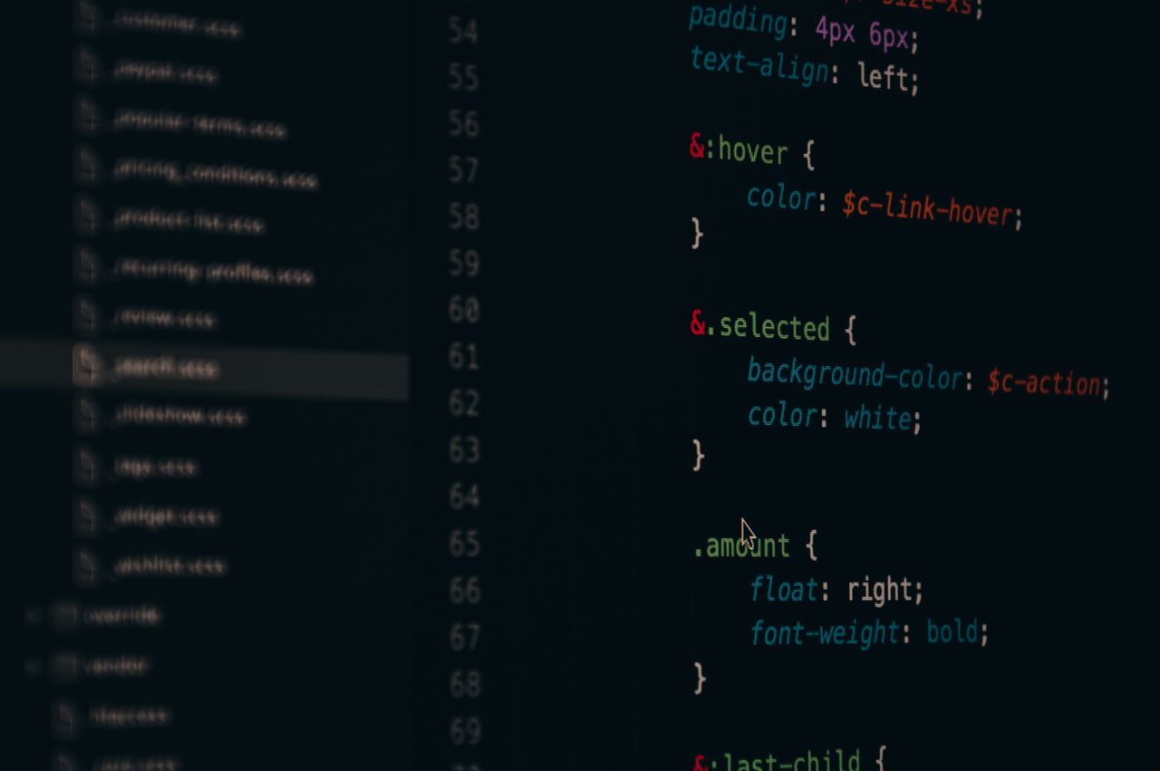 hero-img-02 Close-up of colorful CSS code lines on a computer screen for web development.